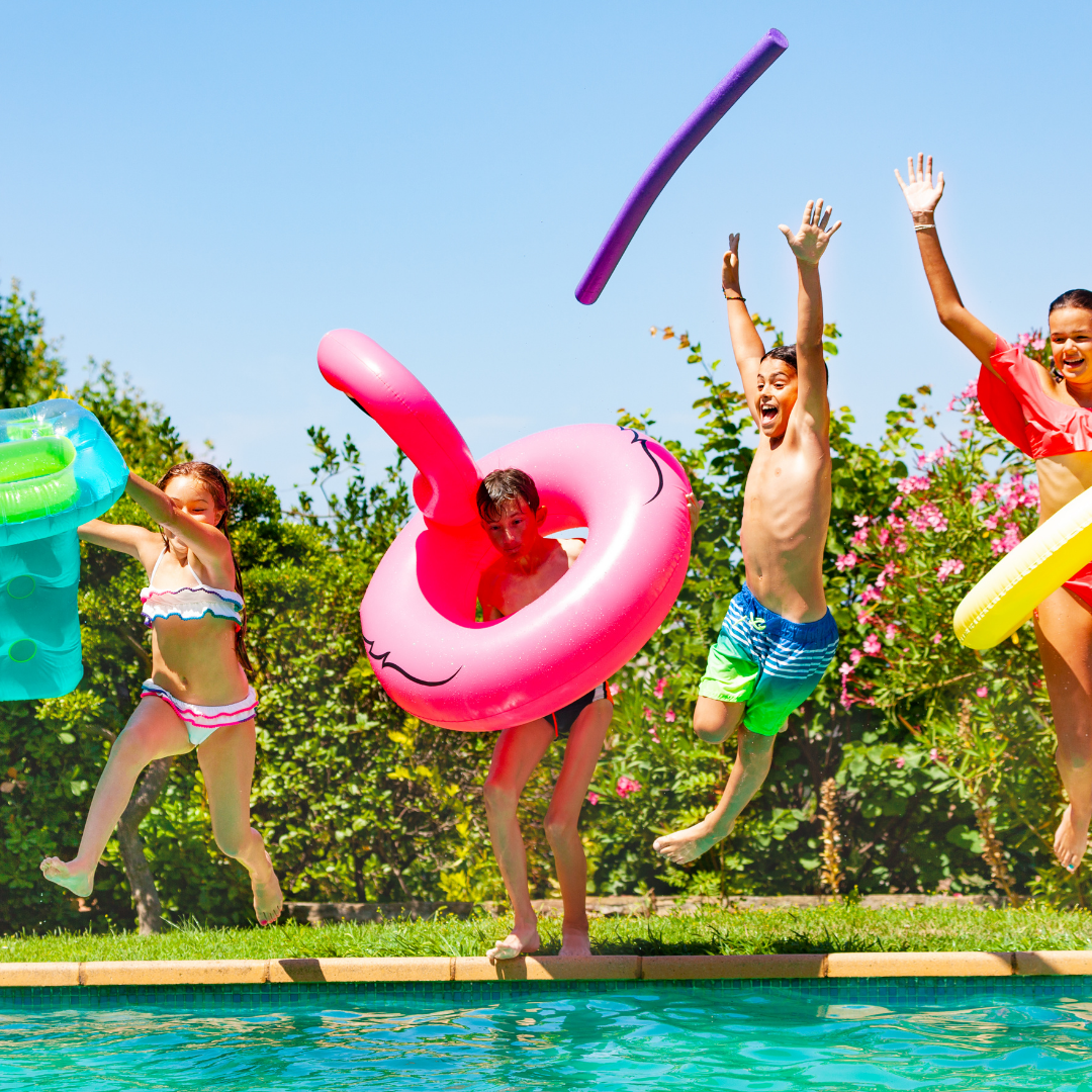 kids jumping into pool